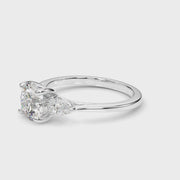 Round with Pear Sides Three Stone Ring