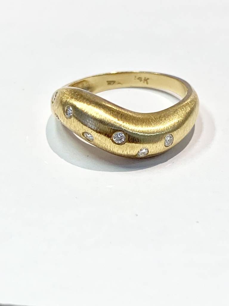 14kt yellow gold curved diamond dome band